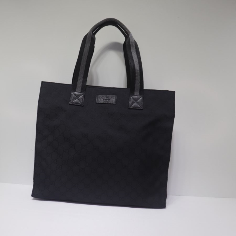 G*u*i shopping bags